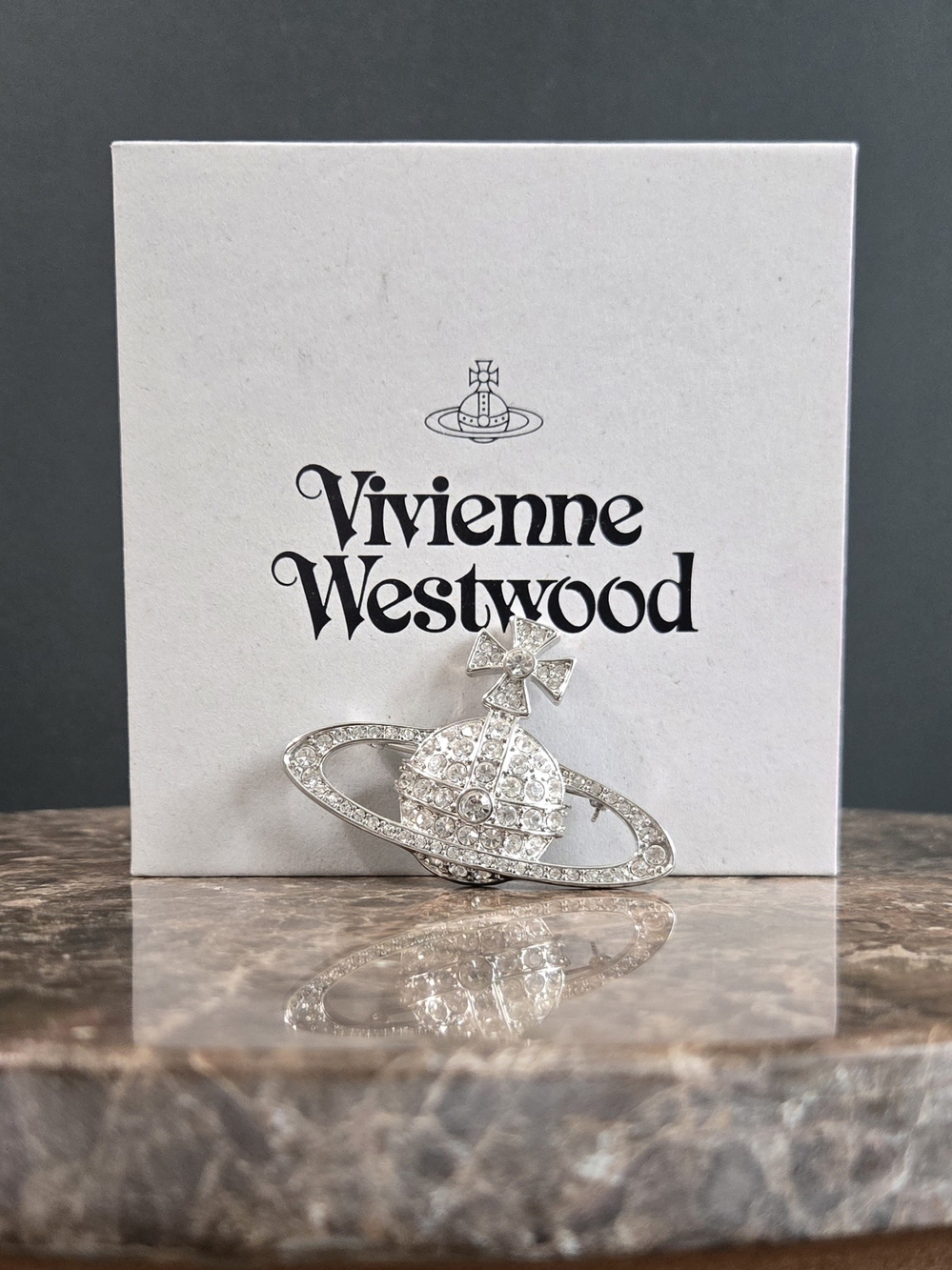 vivienne westwood | bas relief brooch | signature orb crystal | silver tone